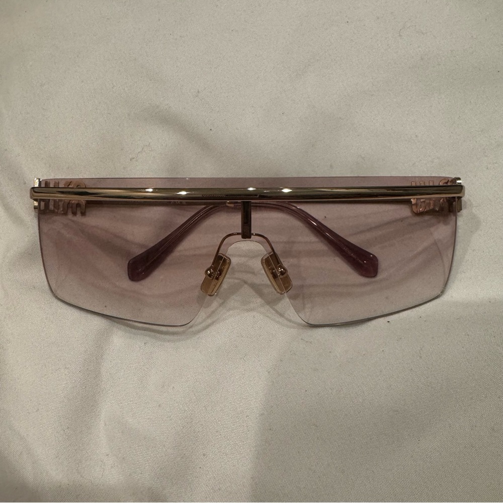 - MIU MIU SUNGLASSES
